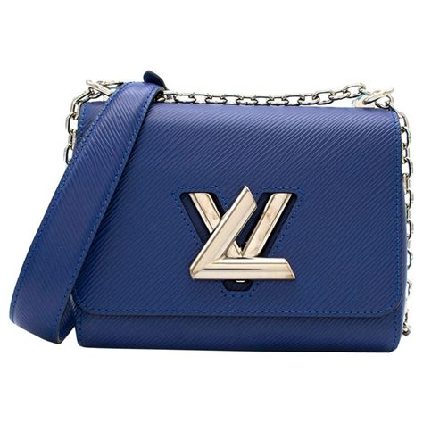 mini blue louis vuitton bag with blue v